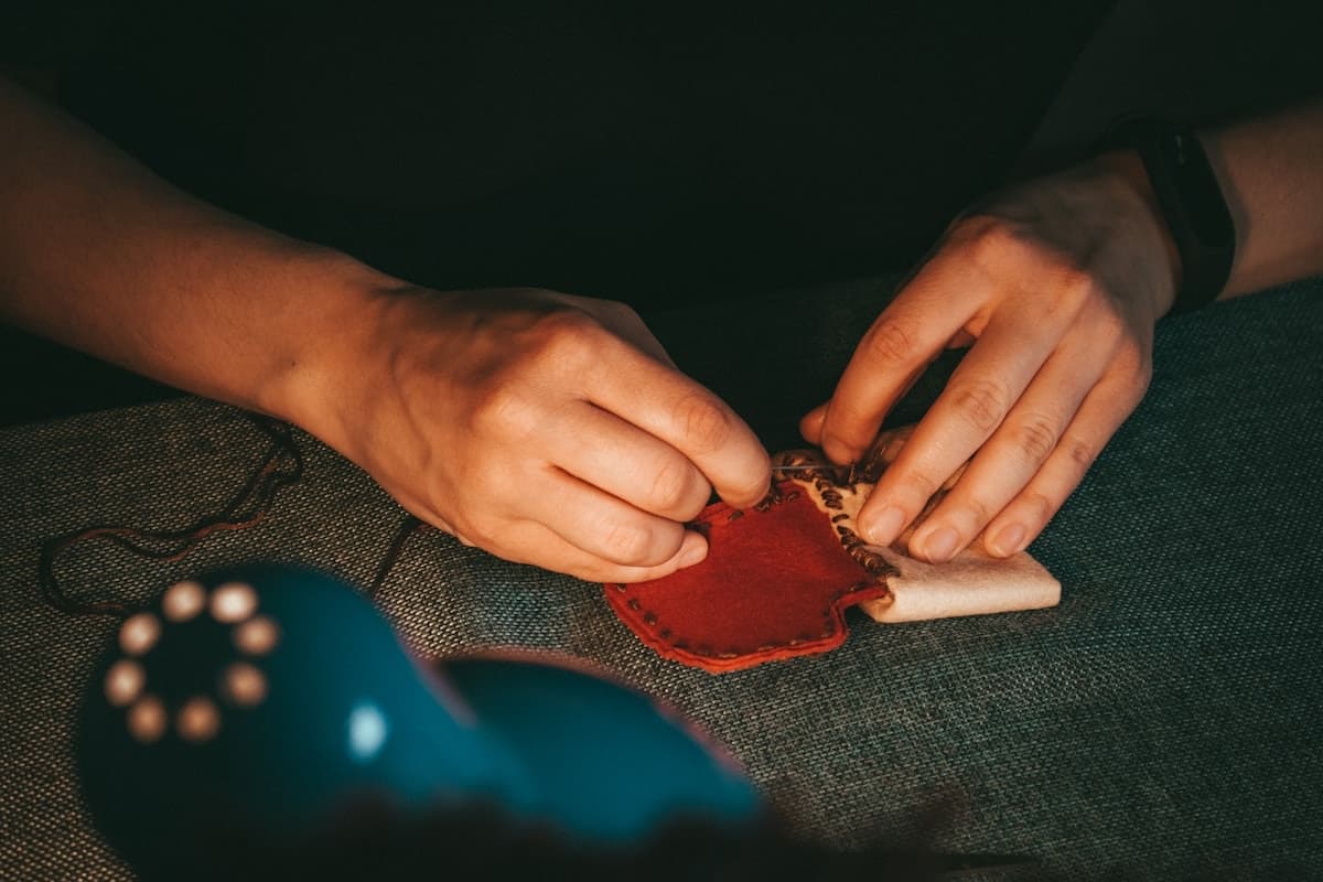 Hand-stitching a leather piece